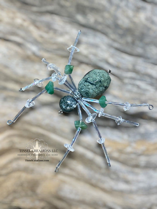 Decorative spider ornament with moss agate and other green stones